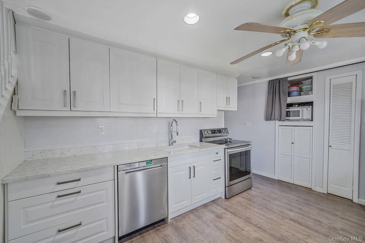 #6 photo, 32 Needle Lane, Levittown , NY 11756