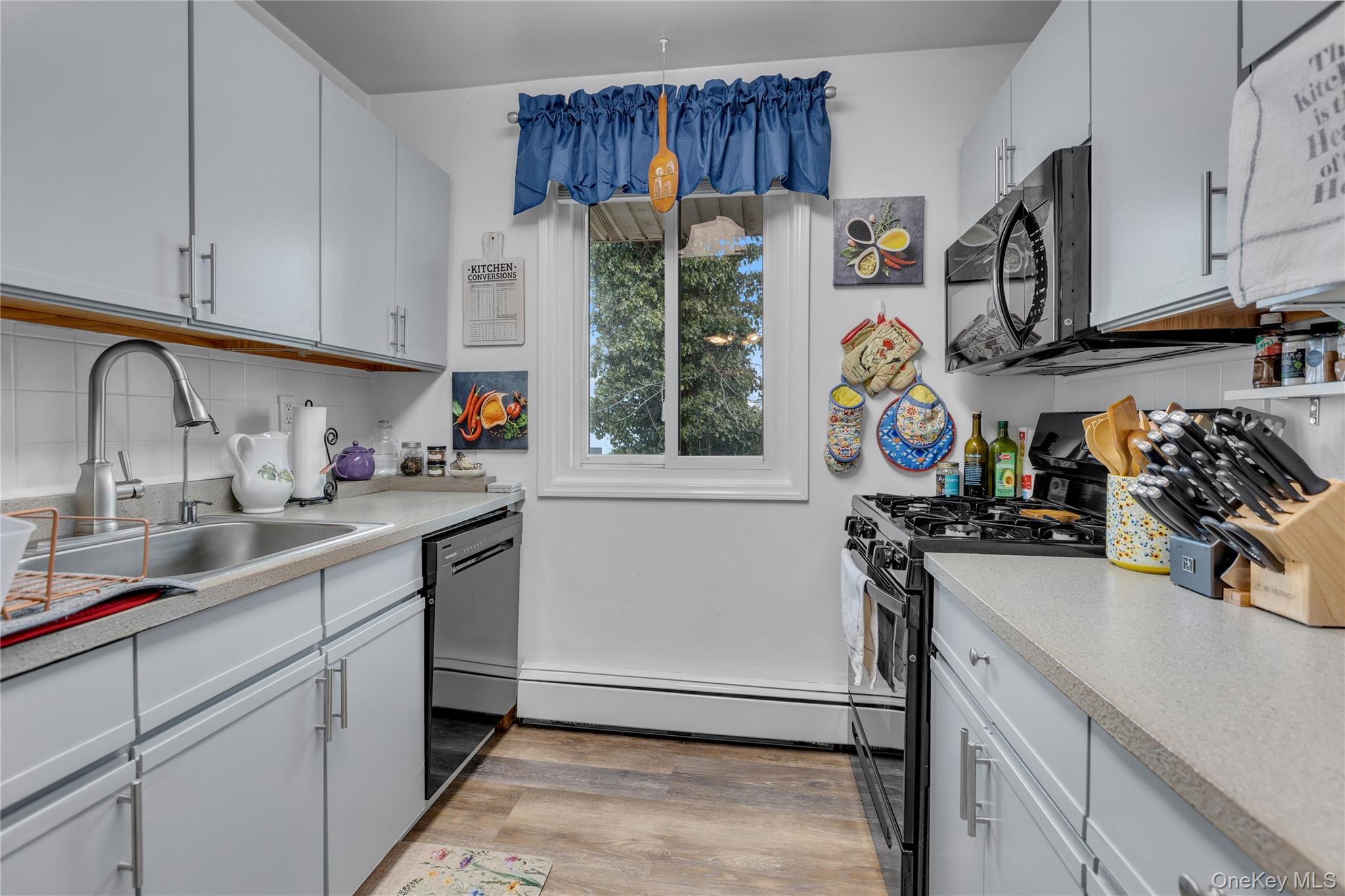 #8 photo, 200 Merrick Road, Amityville , NY 11701