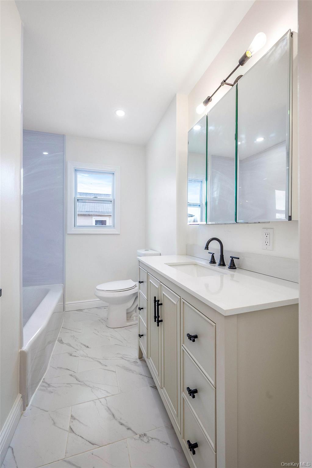 #12 photo, 50 Mahland Place, Oceanside , NY 11572