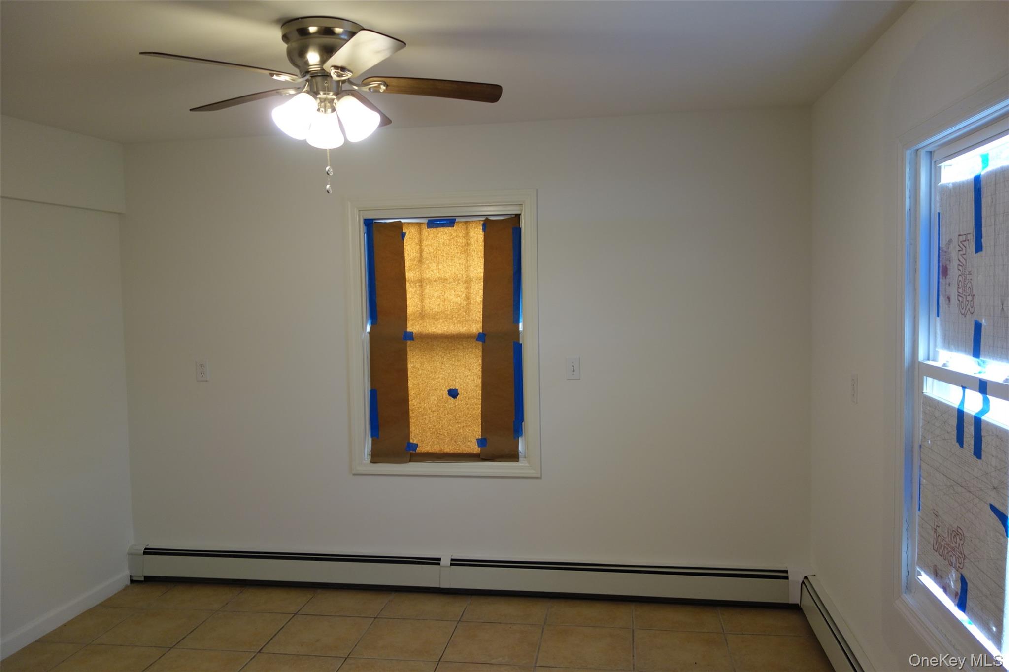 #12 photo, 664 Bryant Street, Westbury , NY 11590