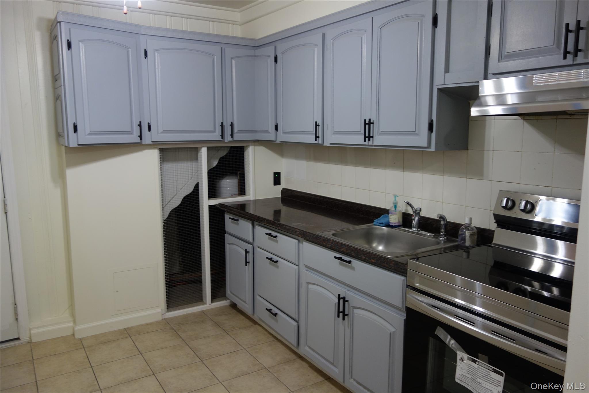 #2 photo, 664 Bryant Street, Westbury , NY 11590