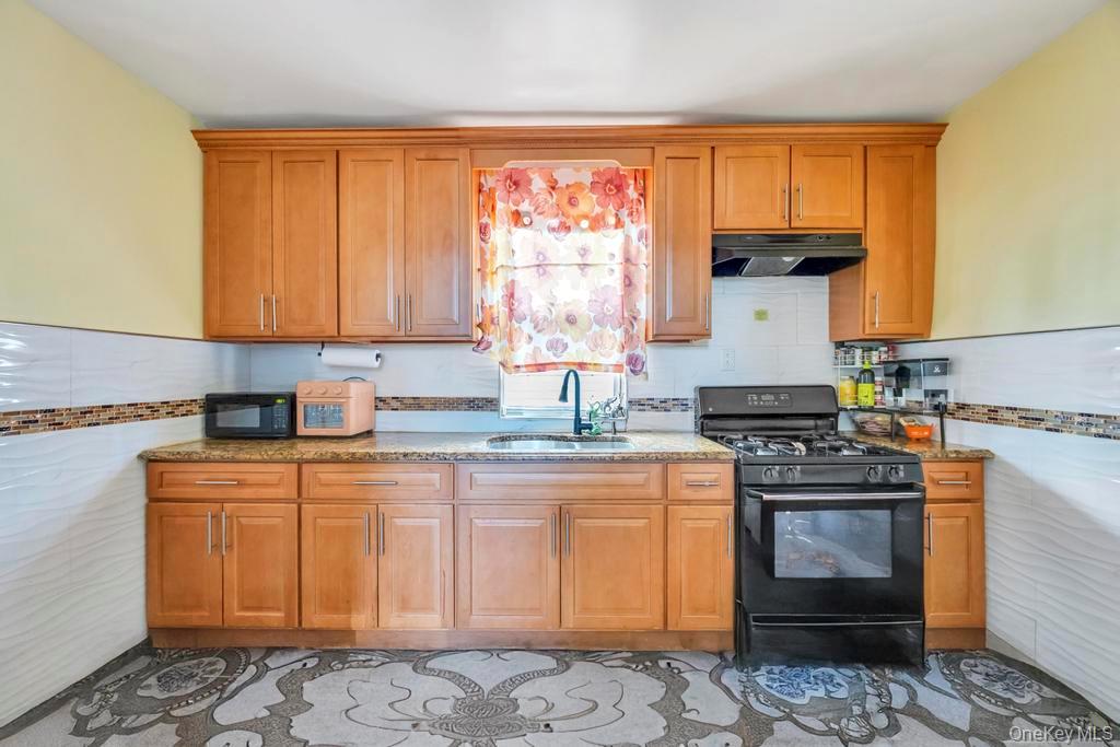 #12 photo, 95-26 86th St, कुईंस Ozone Park , NY 11416