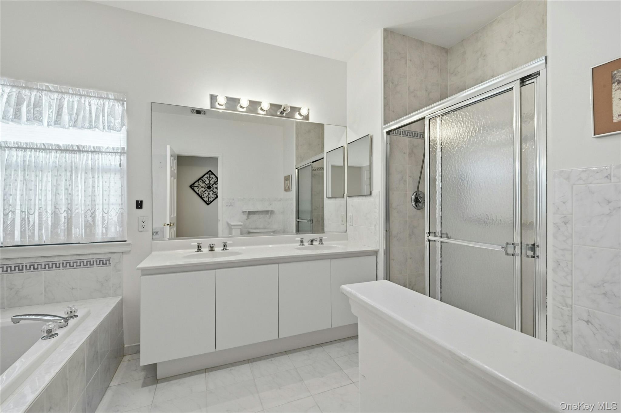 #18 photo, 10 Sagaponack Court, Ridge , NY 11961