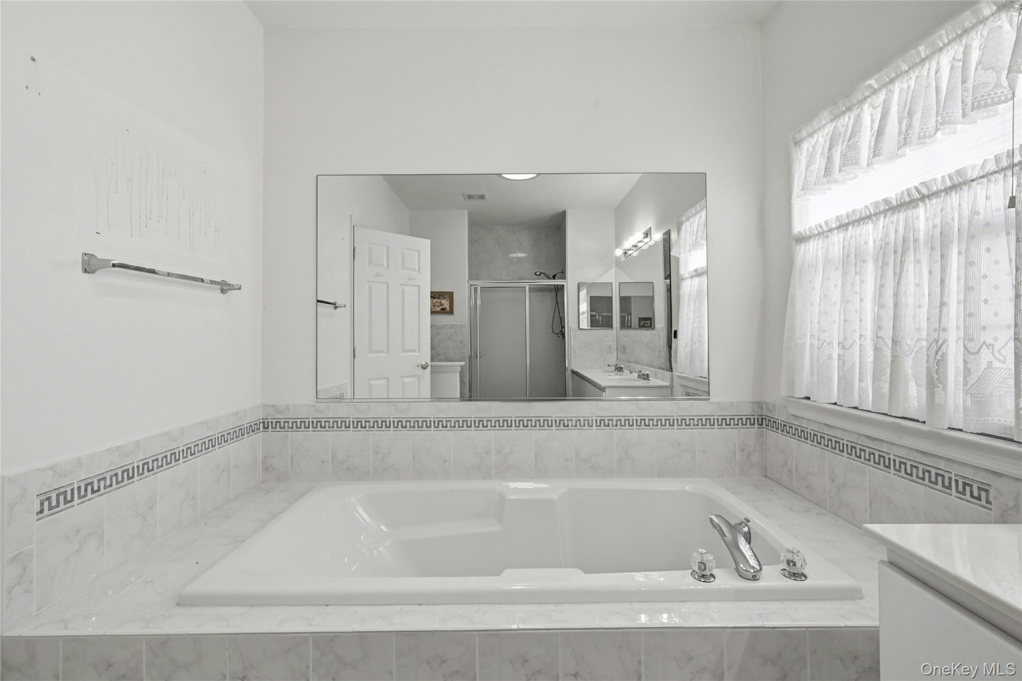 #19 photo, 10 Sagaponack Court, Ridge , NY 11961