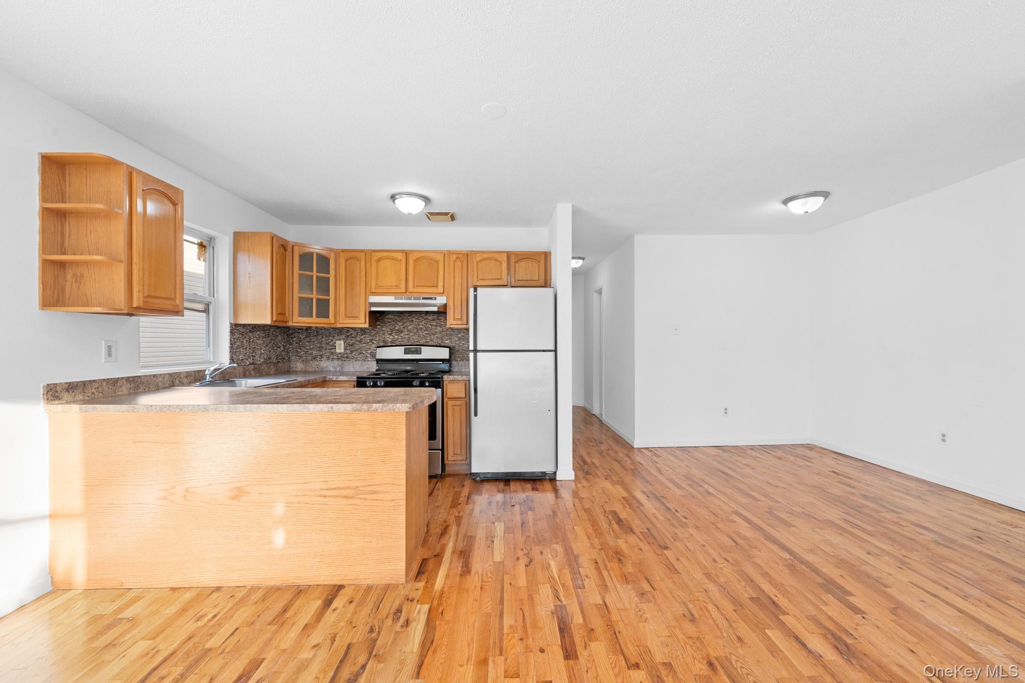 #5 photo, 14027 Coombs Street, Springfield Gardens , NY 11413