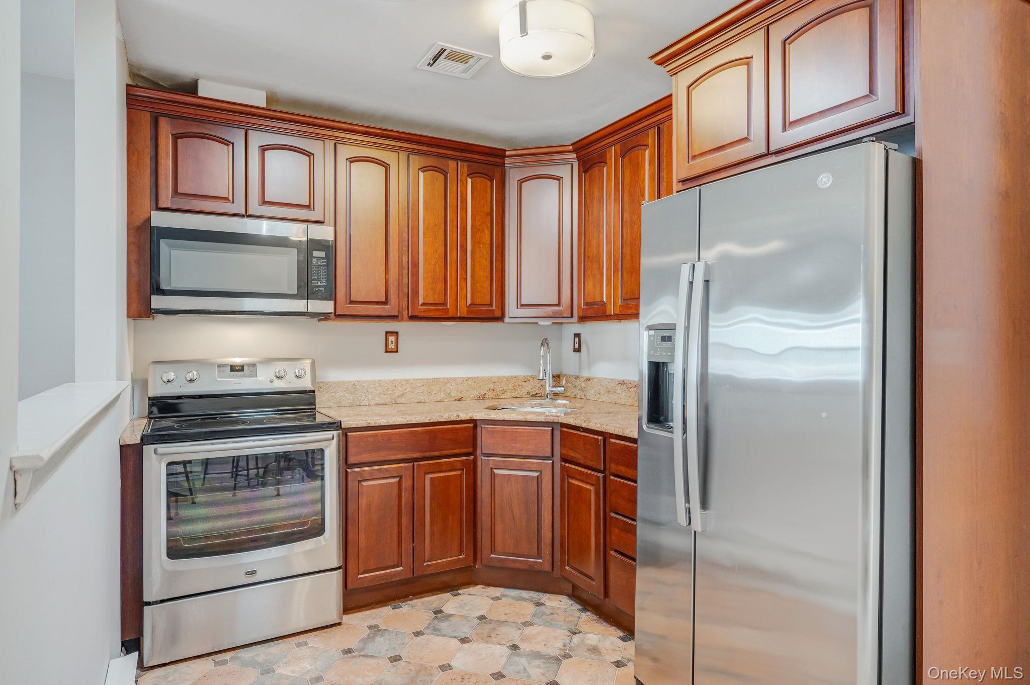 #14 photo, 423 Woodbridge Drive, Ridge , NY 11961