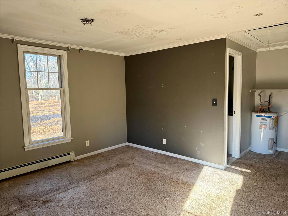 #21 photo, 26 N Swezeytown Road, מחוז סאפוק Middle Island , NY 11953