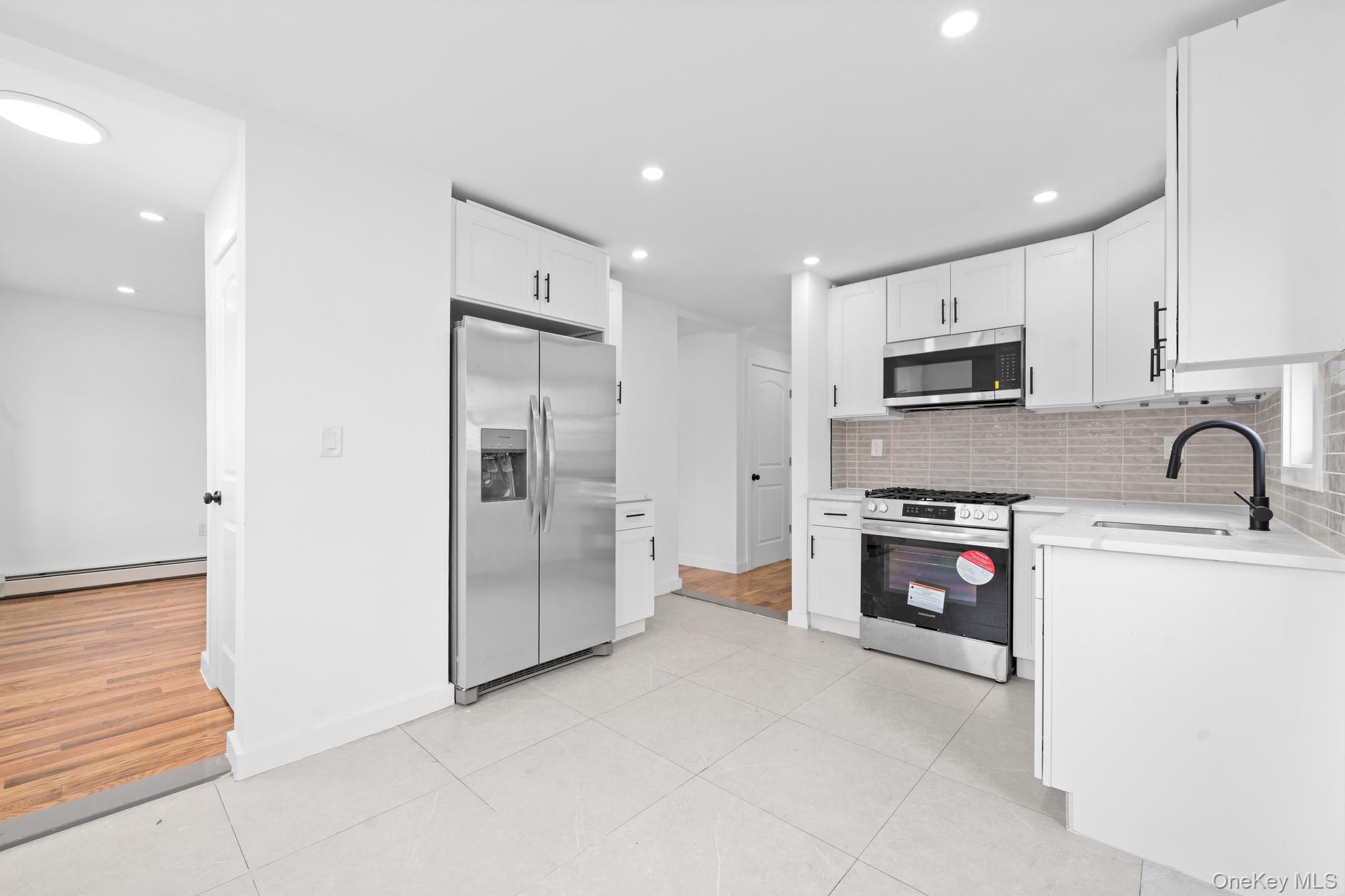 #4 photo, 19311 120th Avenue, कुईंस Saint Albans , NY 11412