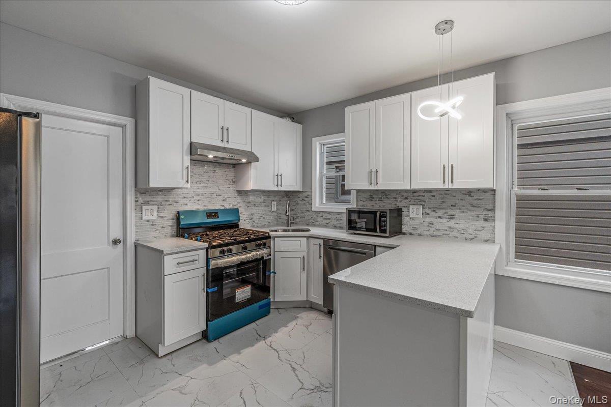 #3 photo, 8925 201st Street, Hollis , NY 11423