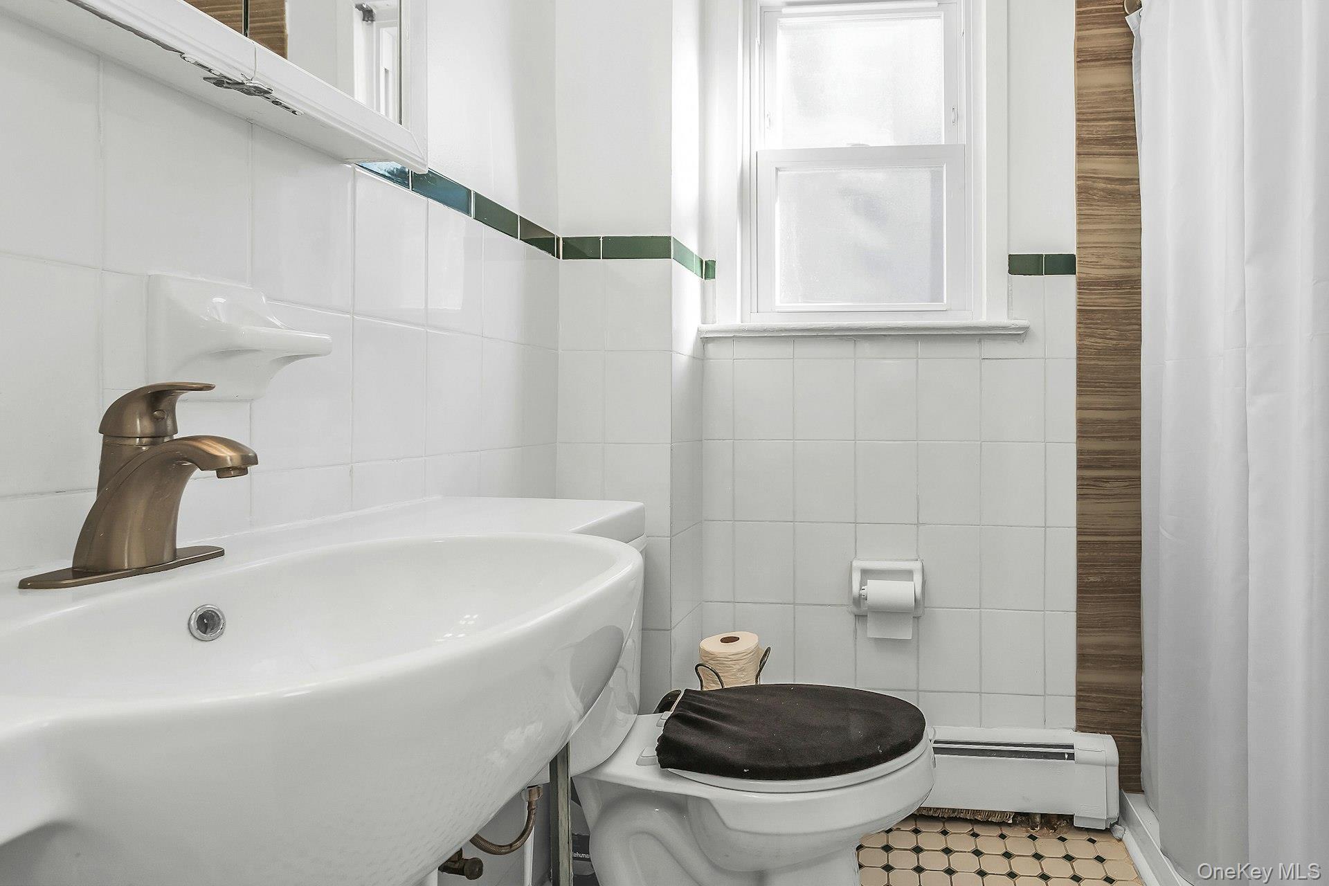 #16 photo, 31 Cedar Street, Roosevelt , NY 11575