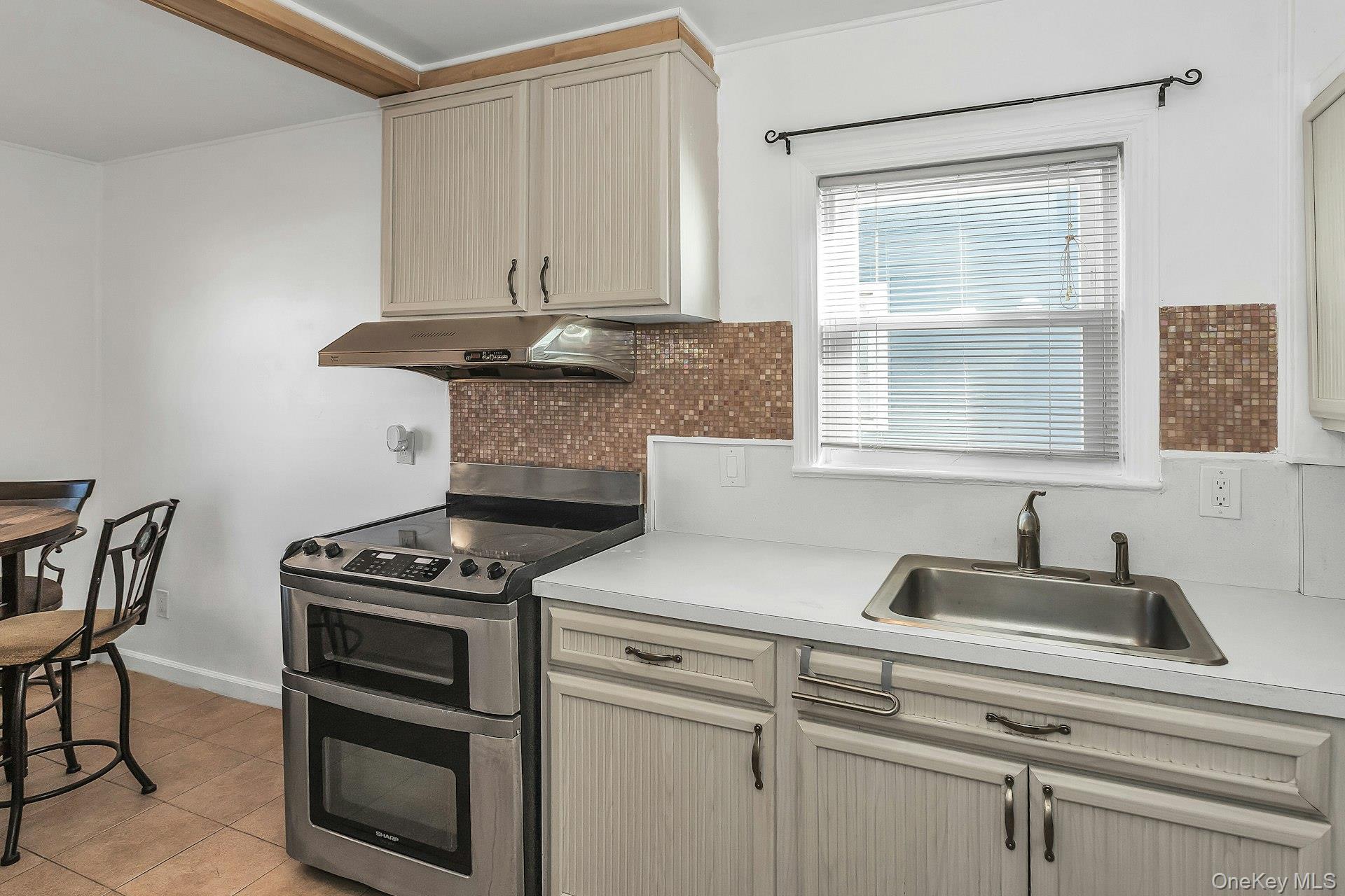 #9 photo, 31 Cedar Street, Roosevelt , NY 11575