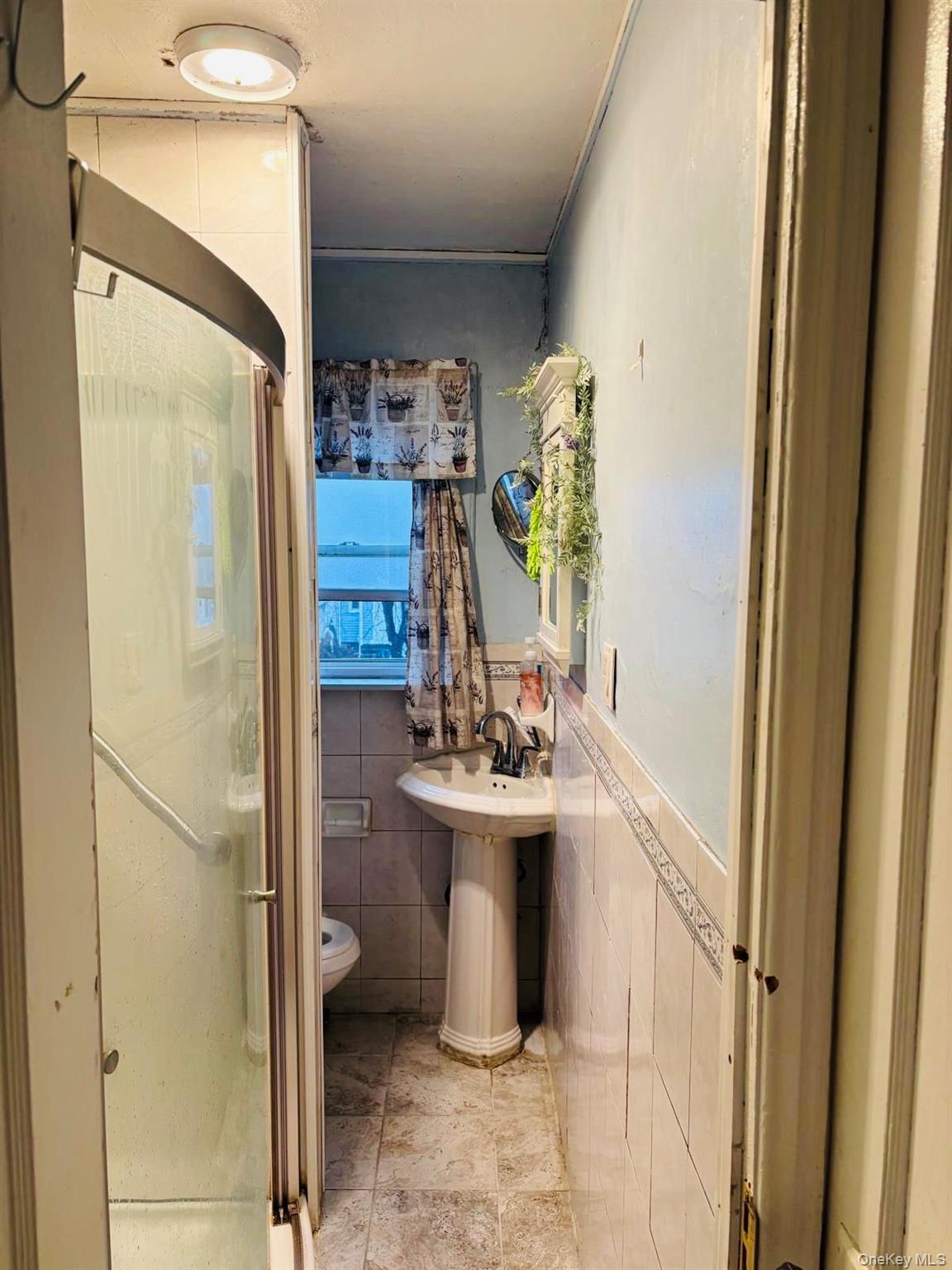 #5 photo, 118-29 152nd Street, Jamaica , NY 11434