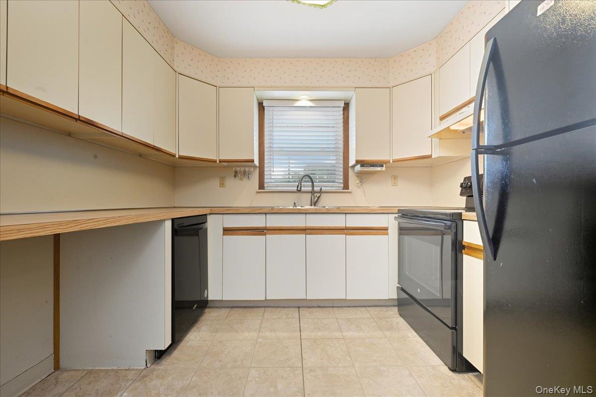 #12 photo, 816 Merillon Avenue, Westbury , NY 11590