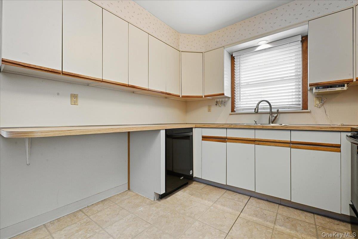 #13 photo, 816 Merillon Avenue, Westbury , NY 11590