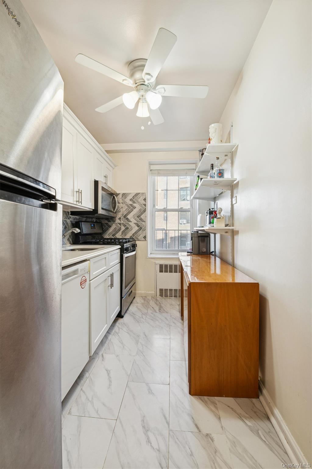 #4 photo, 139-09 84th Drive, Briarwood , NY 11435