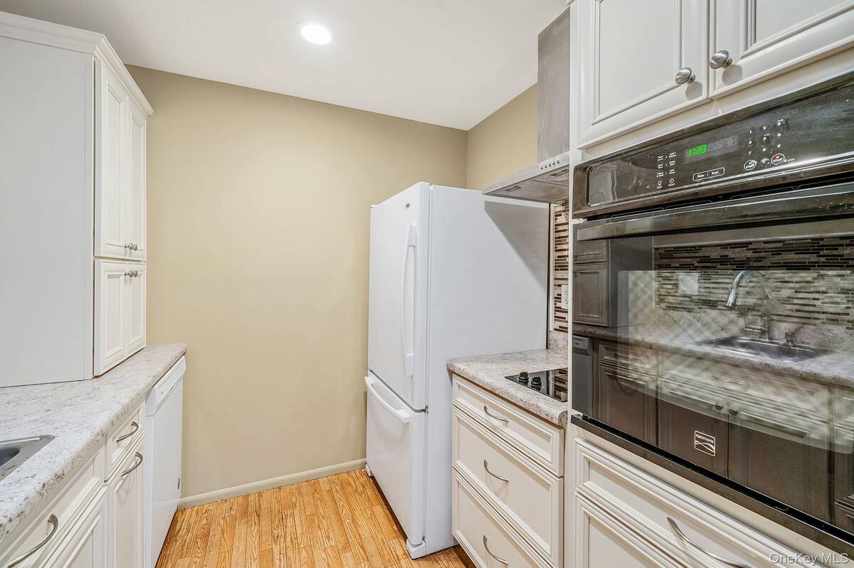 #10 photo, 116 Exmore Court, Ridge , NY 11961