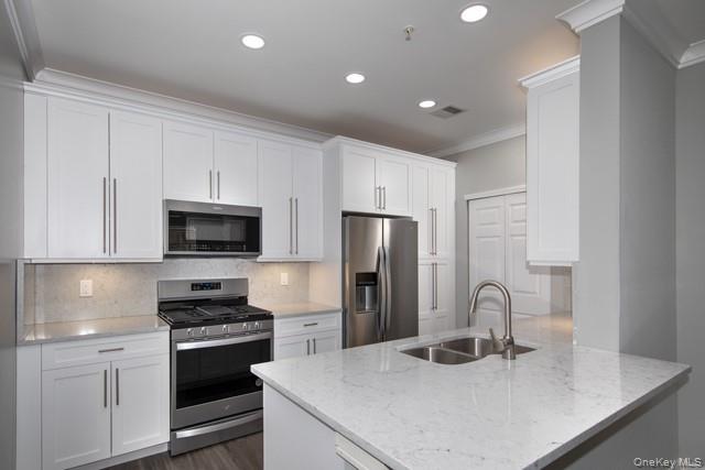 #4 photo, 1 Charles Pond Drive, Coram , NY 11727