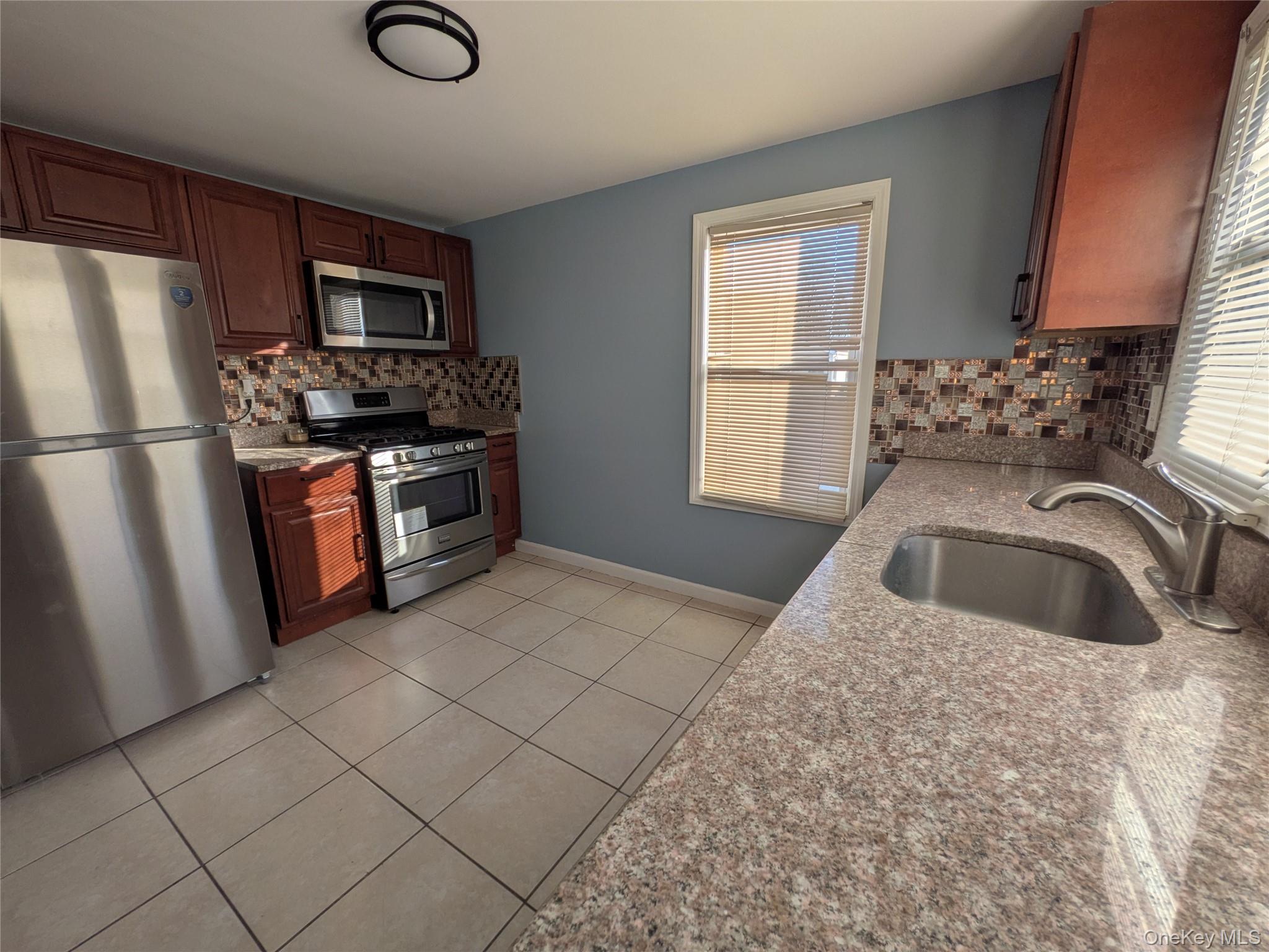 #5 photo, 94 Underhill Avenue, Roosevelt , NY 11575