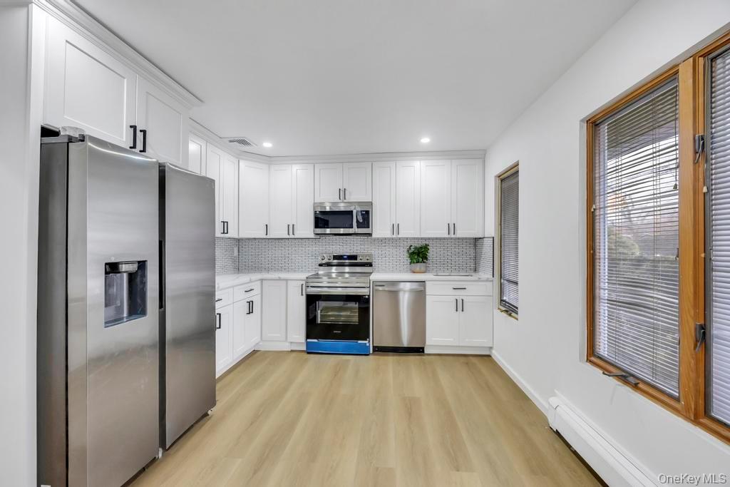 #5 photo, 303 Woodbury Road, מחוז נסאו Hicksville , NY 11801