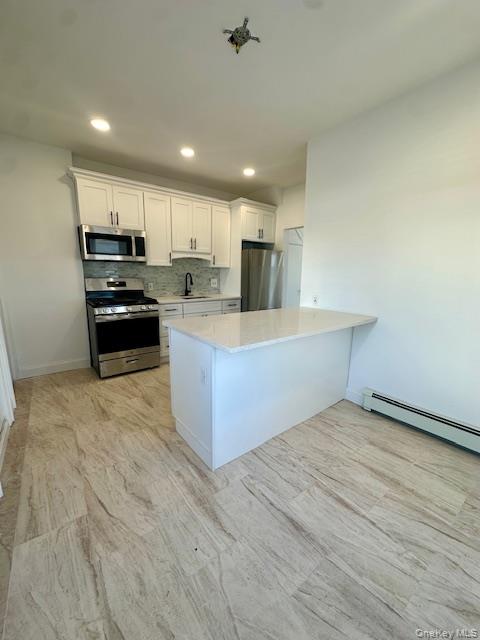 #8 photo, 661 E Olive Street, नासाउ काउंटी Long Beach , NY 11561