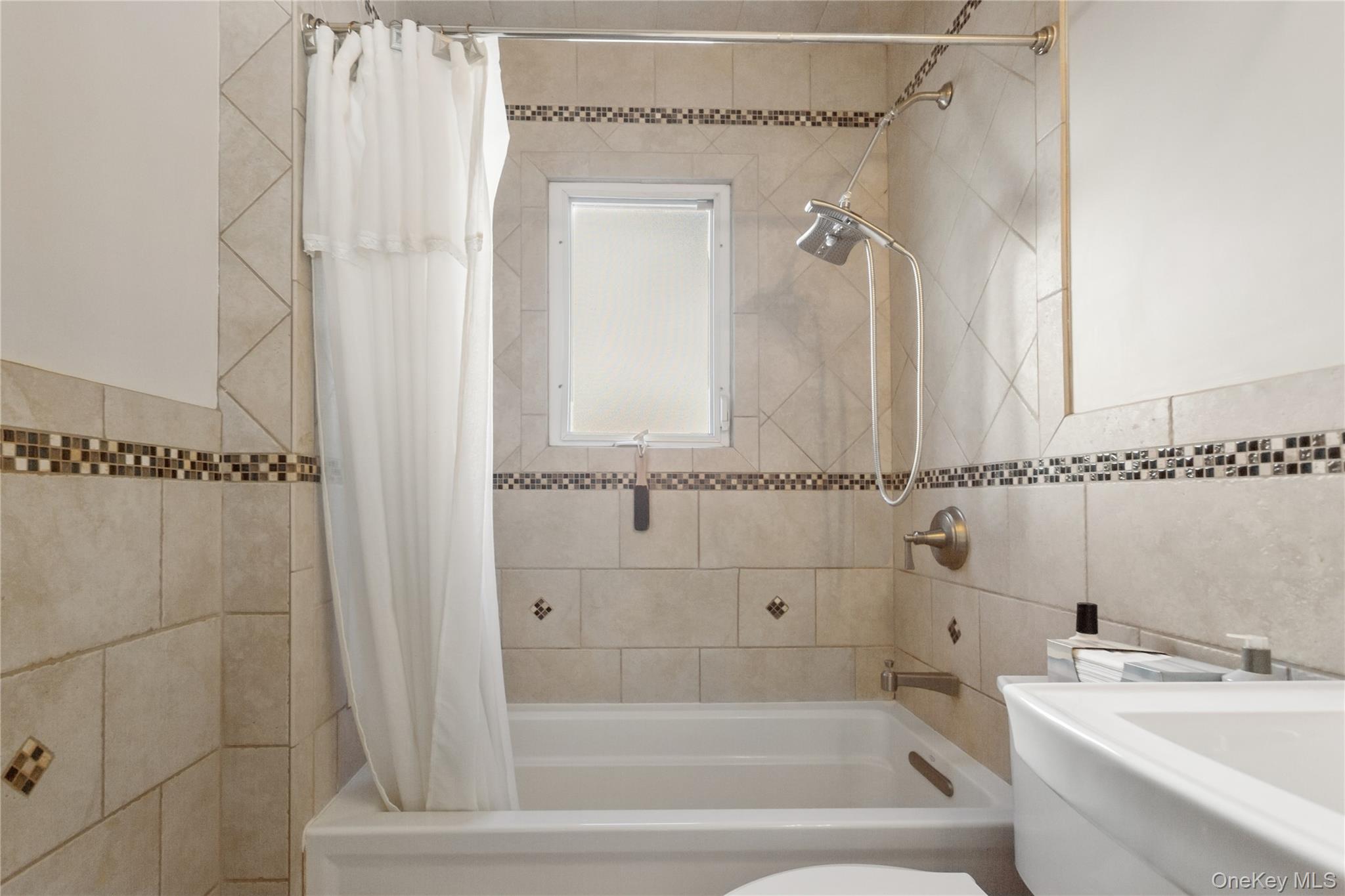 #15 photo, 15 N Oceanside Road, Rockville Centre , NY 11570