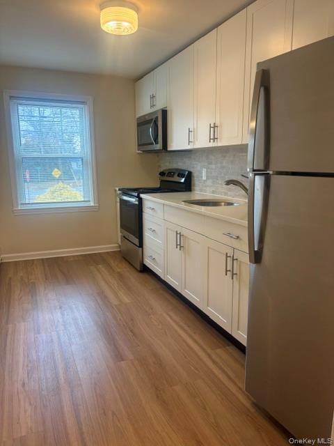 #6 photo, 48 Reservoir Avenue, Northport , NY 11768