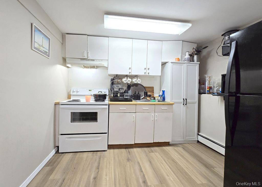 #14 photo, 21A Thorney Avenue, מחוז סאפוק Huntington Station , NY 11746