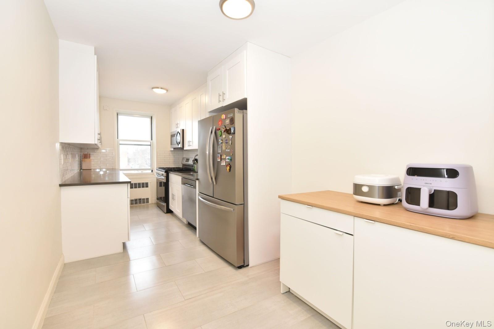 #5 photo, 64-11 99 Street, Rego Park , NY 11374