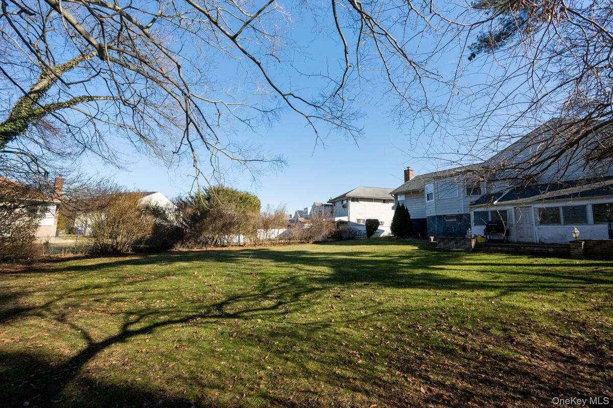 #1 photo, 21 Norton Drive, नासाउ काउंटी Roosevelt , NY 11575