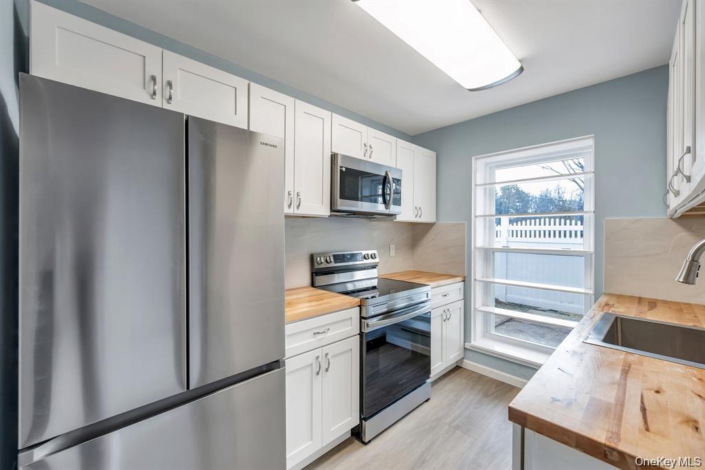 #16 photo, 65 Federal Lane, Саффолк ‖ Coram , NY 11727