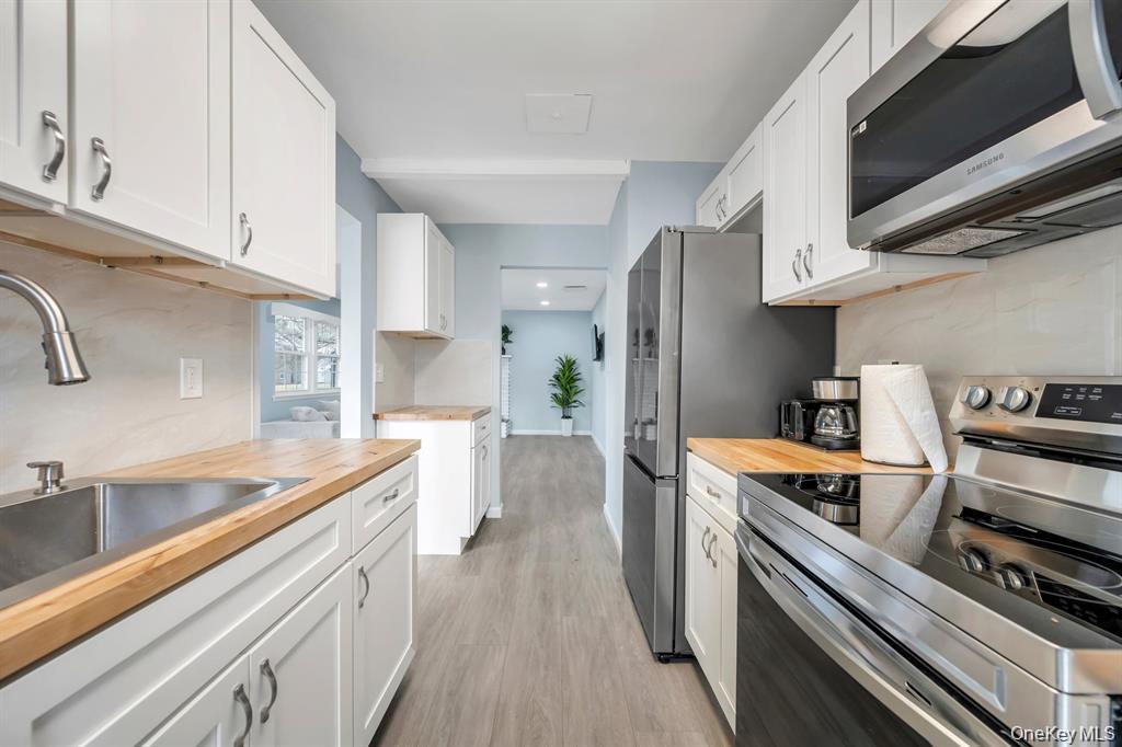 #19 photo, 65 Federal Lane, Саффолк ‖ Coram , NY 11727