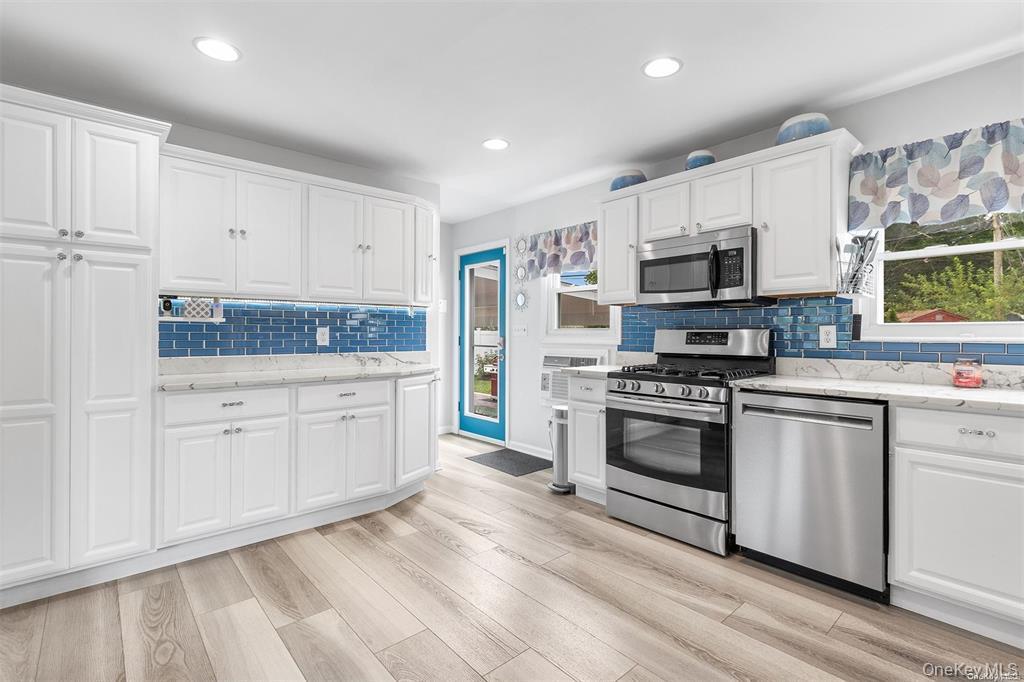 #4 photo, 71 Hunter Lane, Centereach , NY 11720