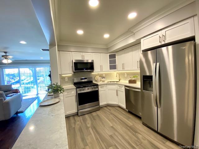 #2 photo, 105 Westwood Drive, Westbury , NY 11590