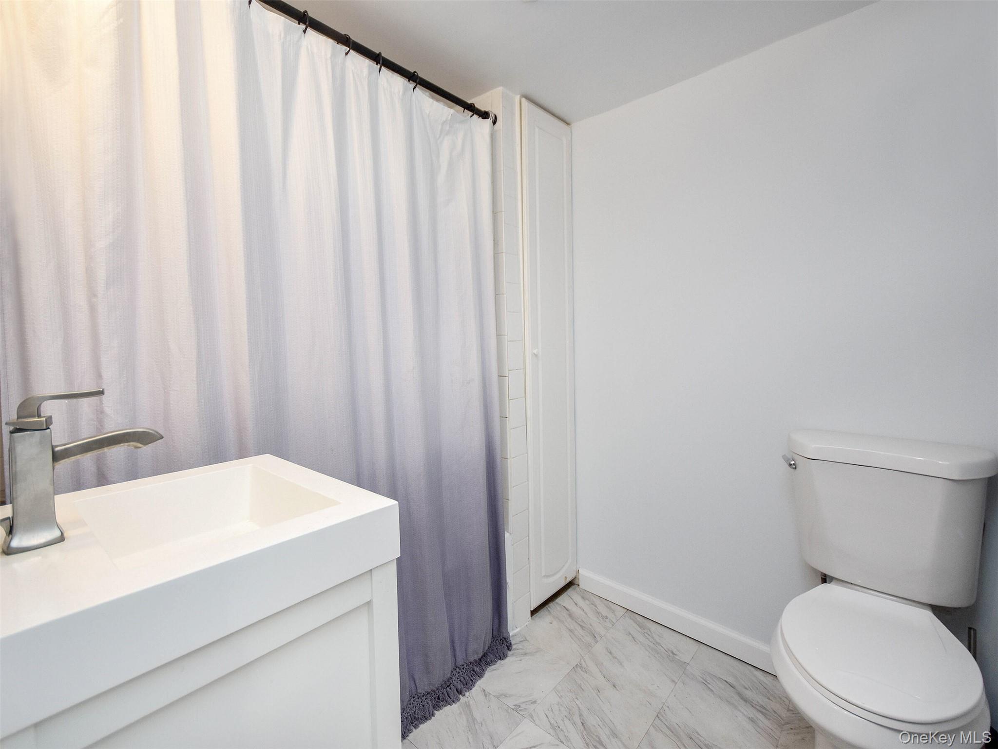 #12 photo, 12 2nd Avenue, Port Washington , NY 11050