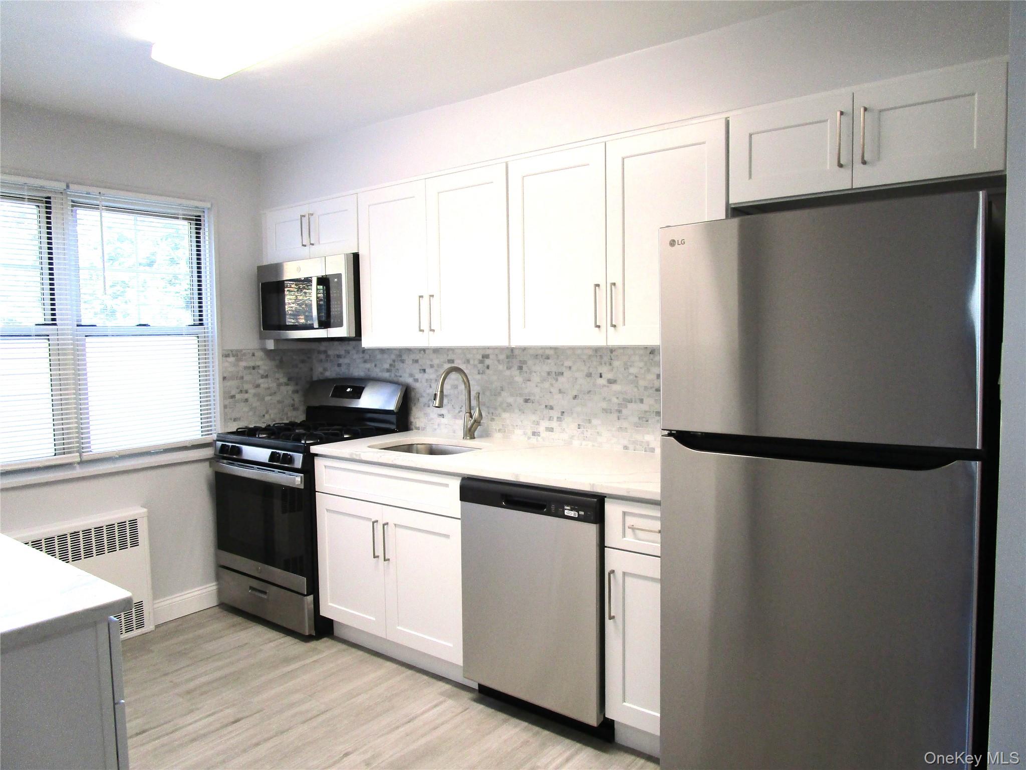 #16 photo, 324 Post Avenue, Westbury , NY 11590