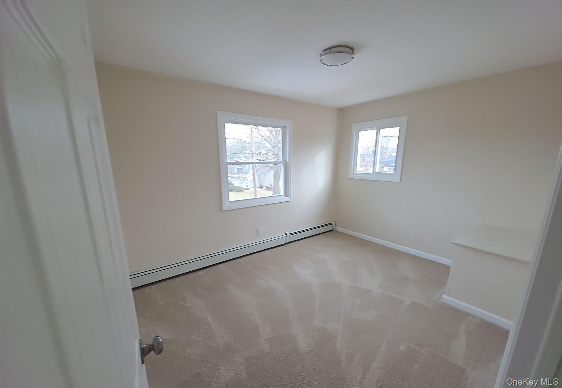 #13 photo, 519 Advent Street, Westbury , NY 11590