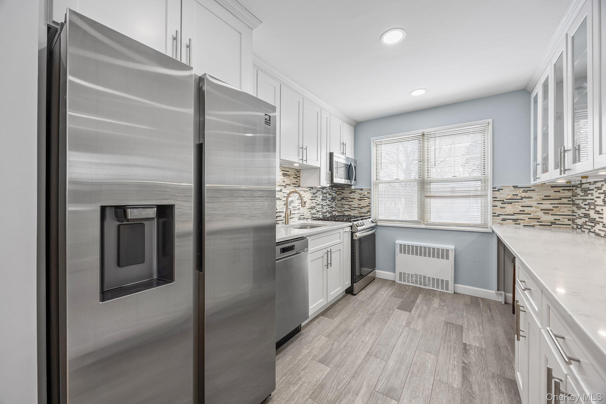 #9 photo, 324 Post Avenue, Westbury , NY 11590