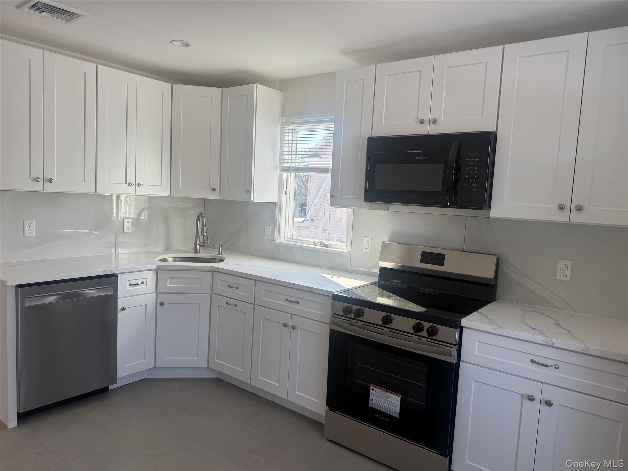 #3 photo, 261 Wilson Avenue, Westbury , NY 11590