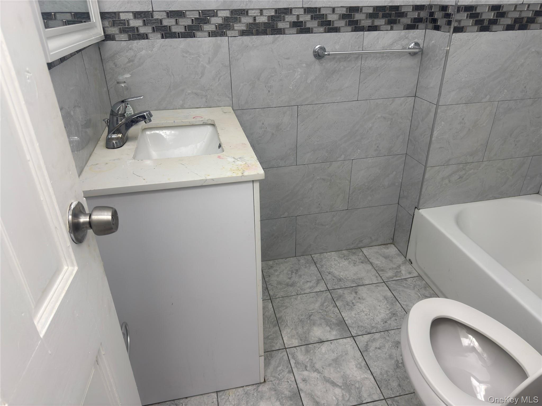 #5 photo, 93-45 202nd Street, Hollis , NY 11423