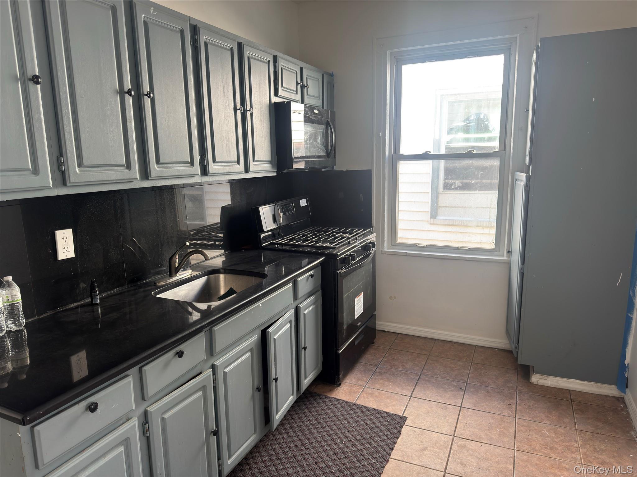 #9 photo, 93-45 202nd Street, Hollis , NY 11423