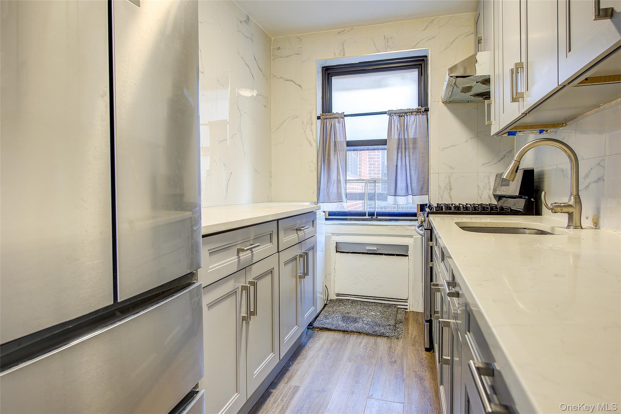 #11 photo, 211-02 73rd Avenue, Oakland Gardens , NY 11364