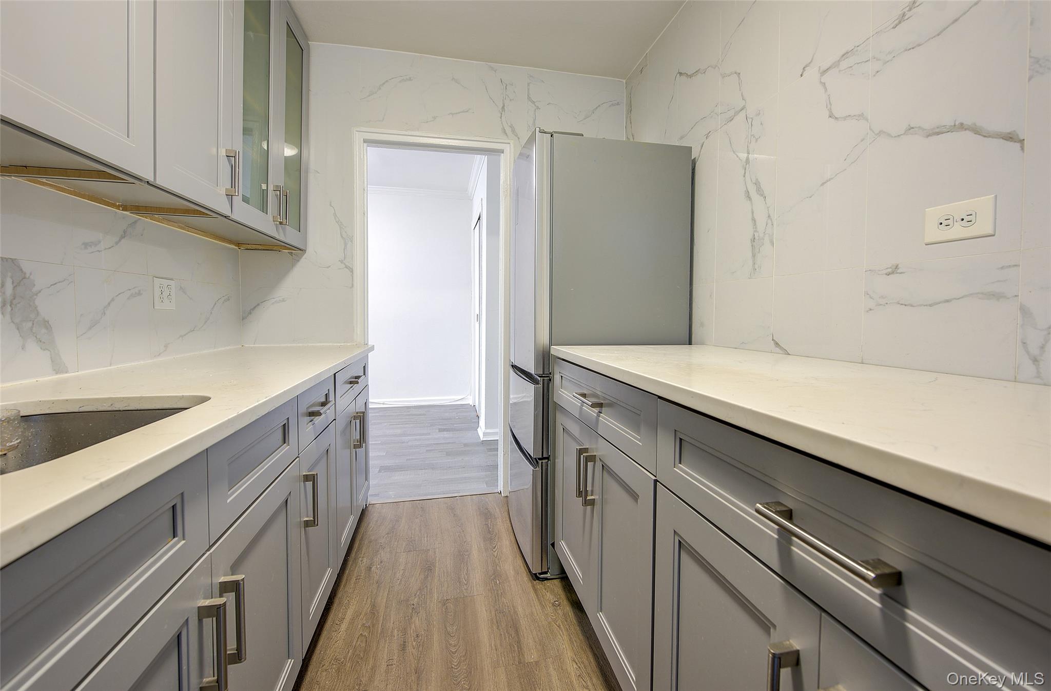 #12 photo, 211-02 73rd Avenue, Oakland Gardens , NY 11364