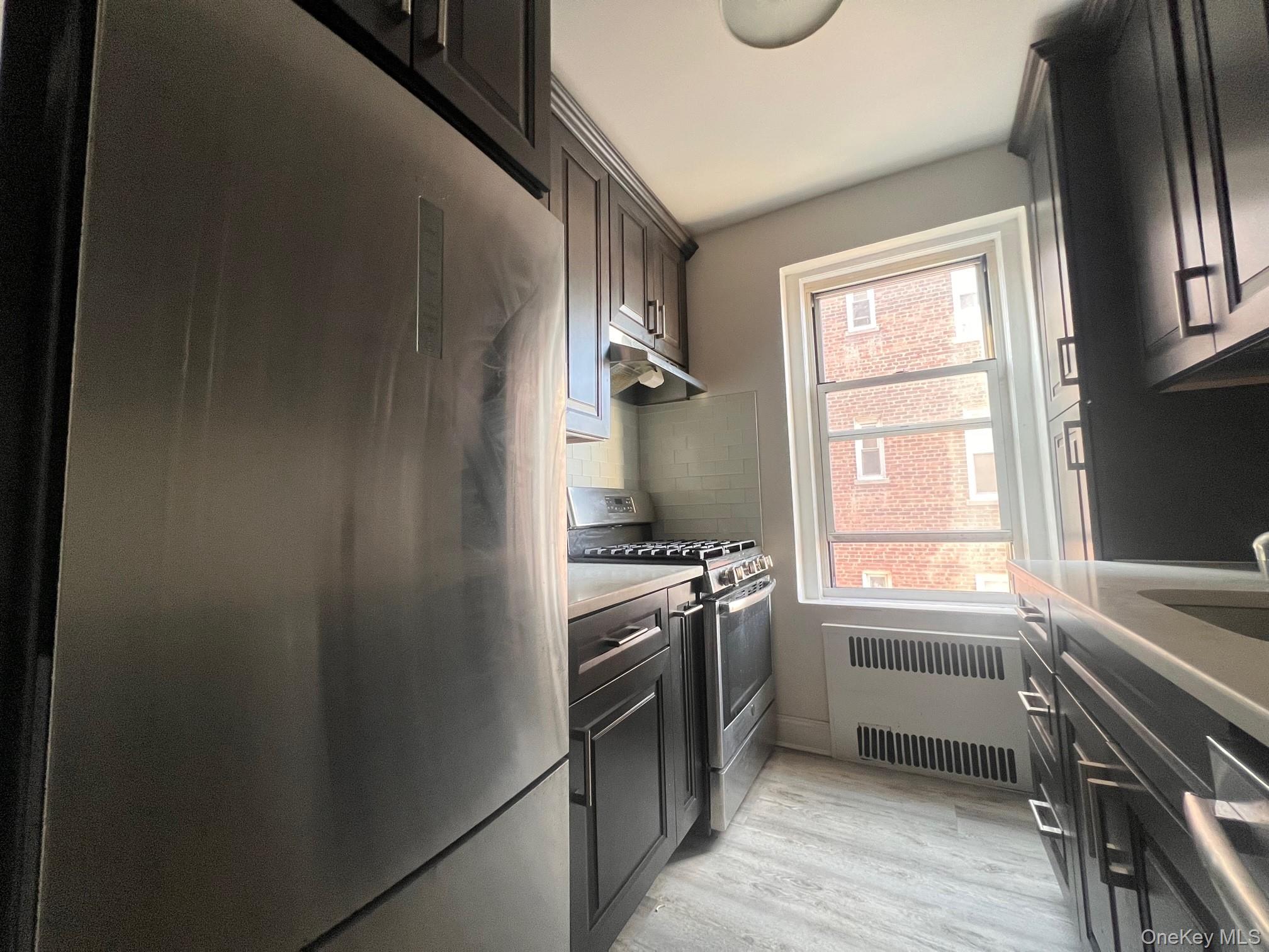 #14 photo, 63-109 Saunders St, Rego Park , NY 11374