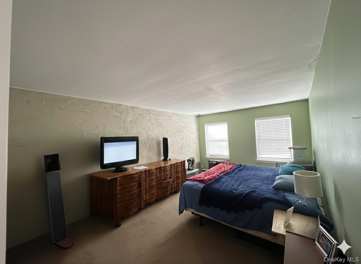 #13 photo, 305 Towne House Village, Islandia , NY 11749