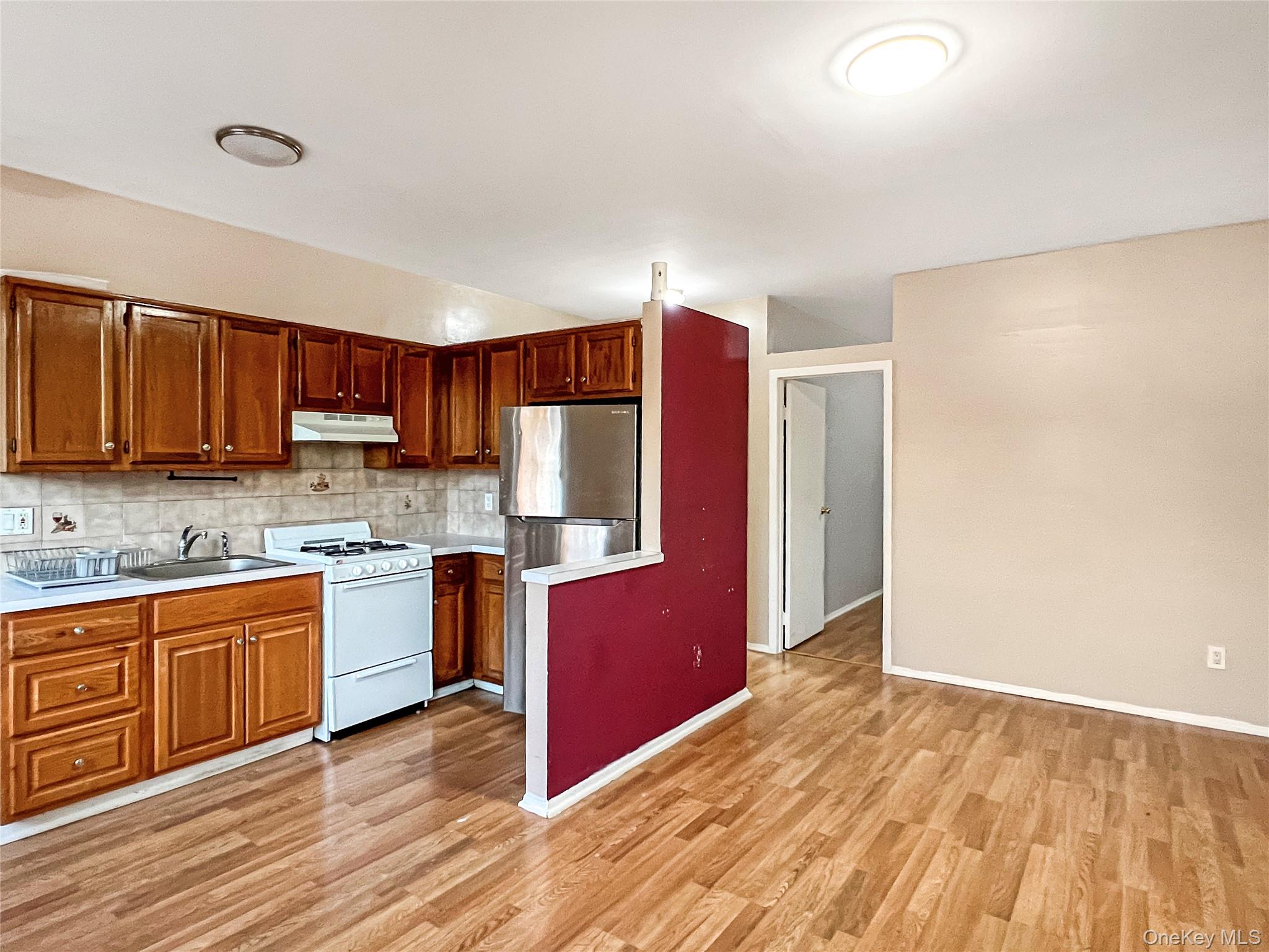 #5 photo, 9206 95th Avenue, Ozone Park , NY 11416