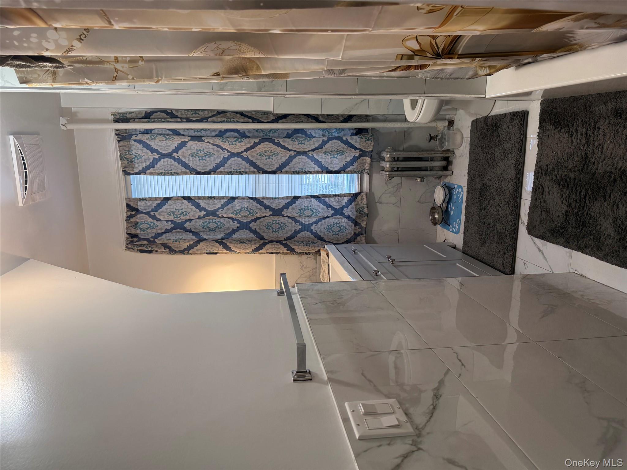 #16 photo, 9817 217th Lane, कुईंस Queens Village , NY 11429