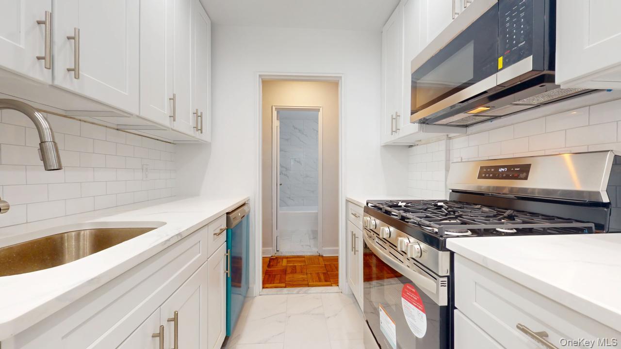 #11 photo, 66-15 Thornton Place, Rego Park , NY 11374