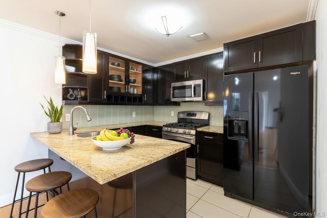 #12 photo, 10929 103rd Street, कुईंस Ozone Park , NY 11417