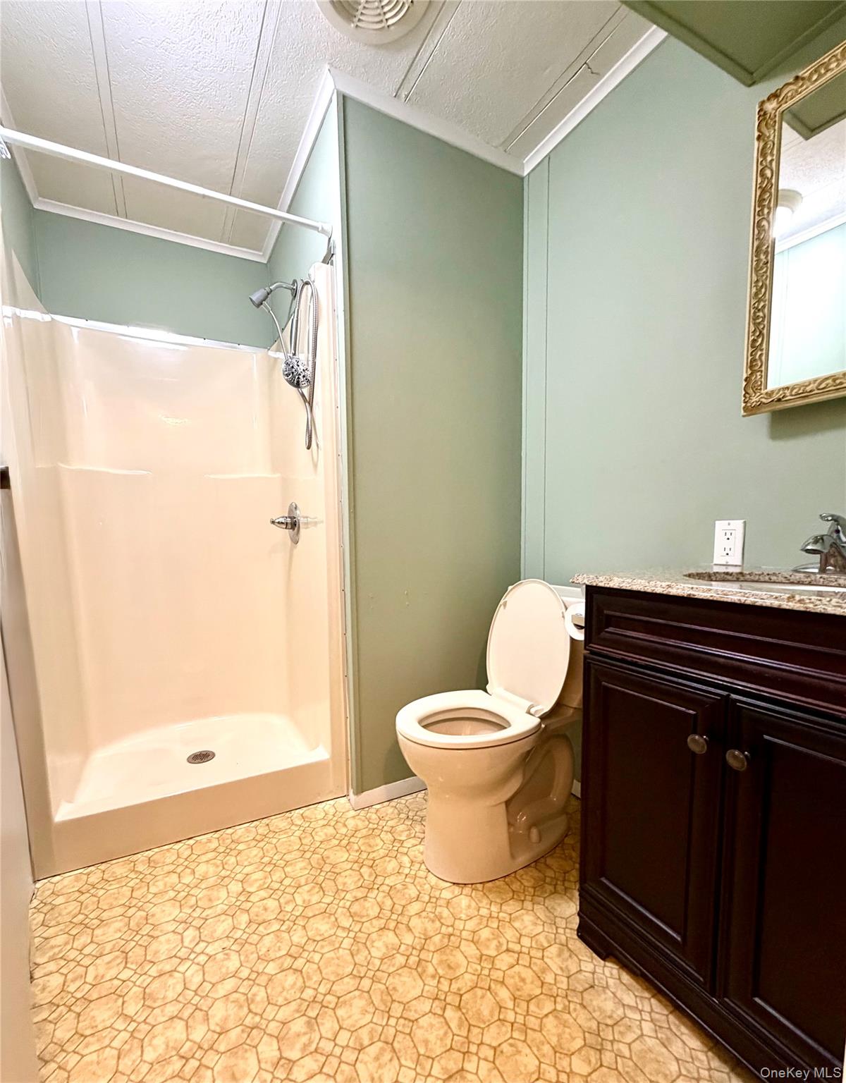 #9 photo, 16 Village Circle, Manorville , NY 11949