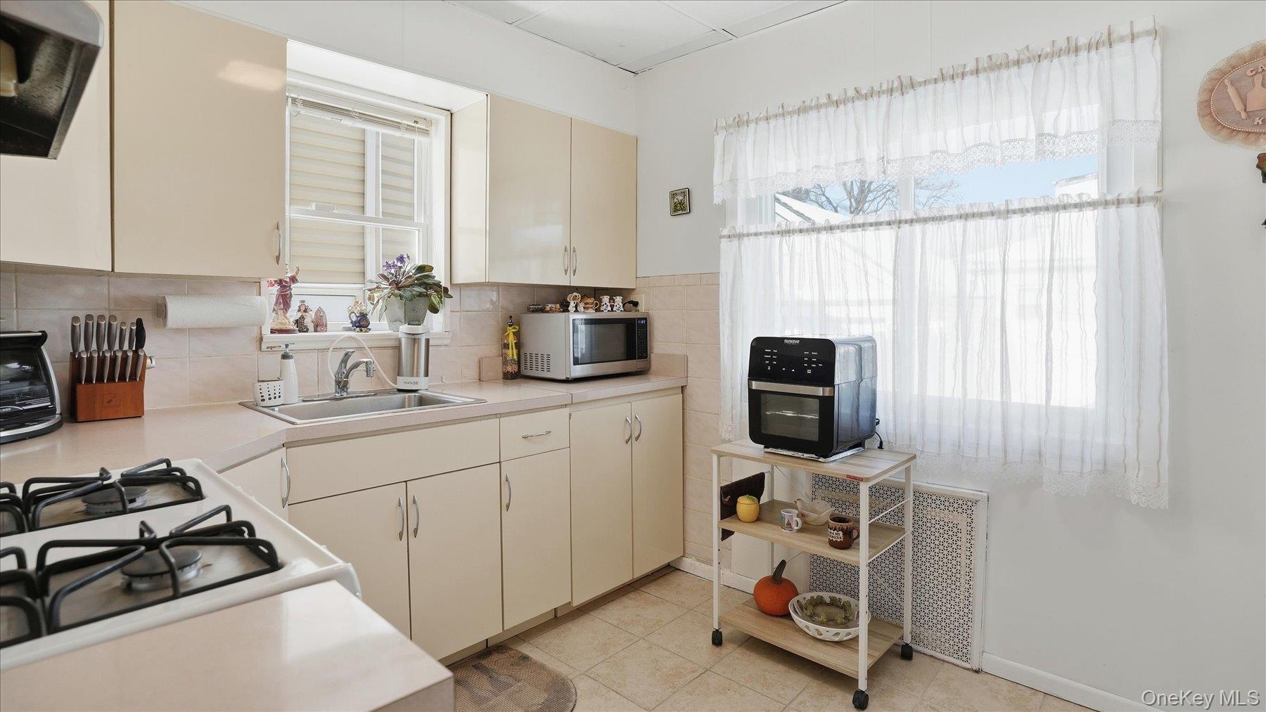 #12 photo, 10617 95th Avenue, Ozone Park , NY 11416